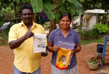Sri Lankan residents with their new home